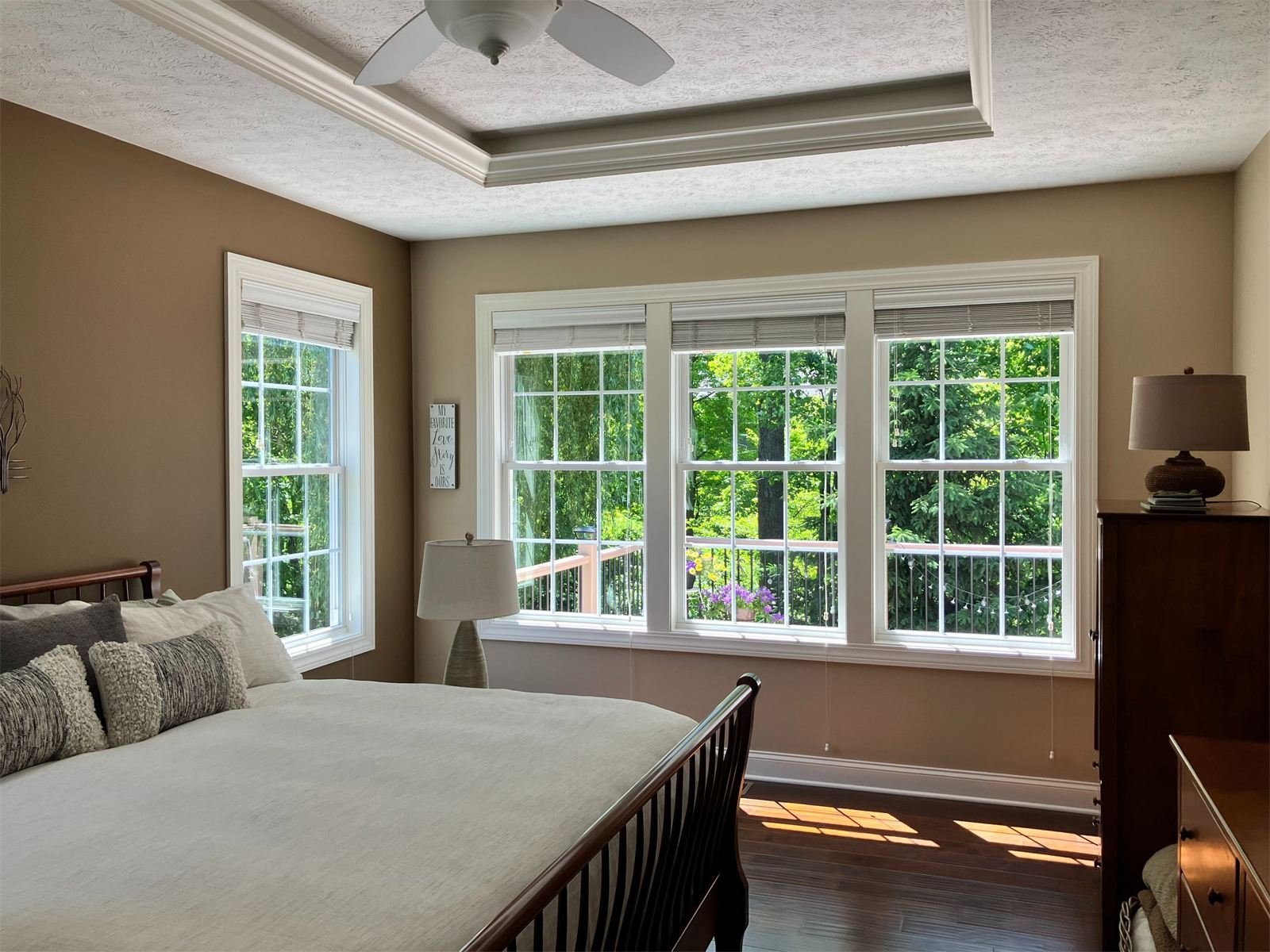 Sunlit bedroom with clean windows